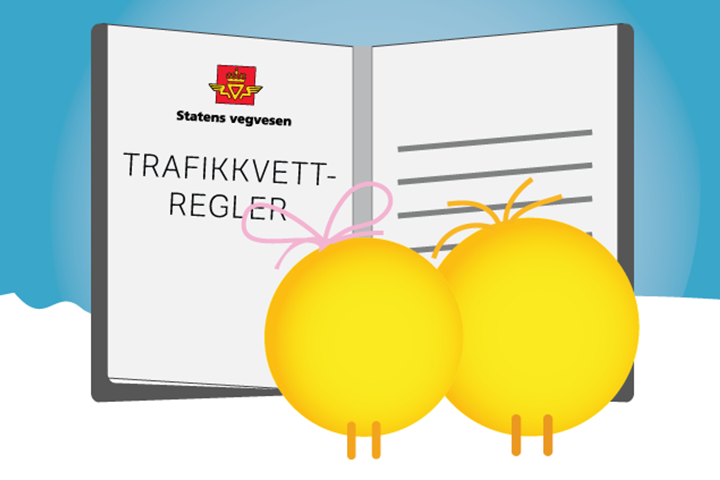 Illustrasjonsfoto av to påskekyllinger som leser Statens vegvesen sine trafikkregler